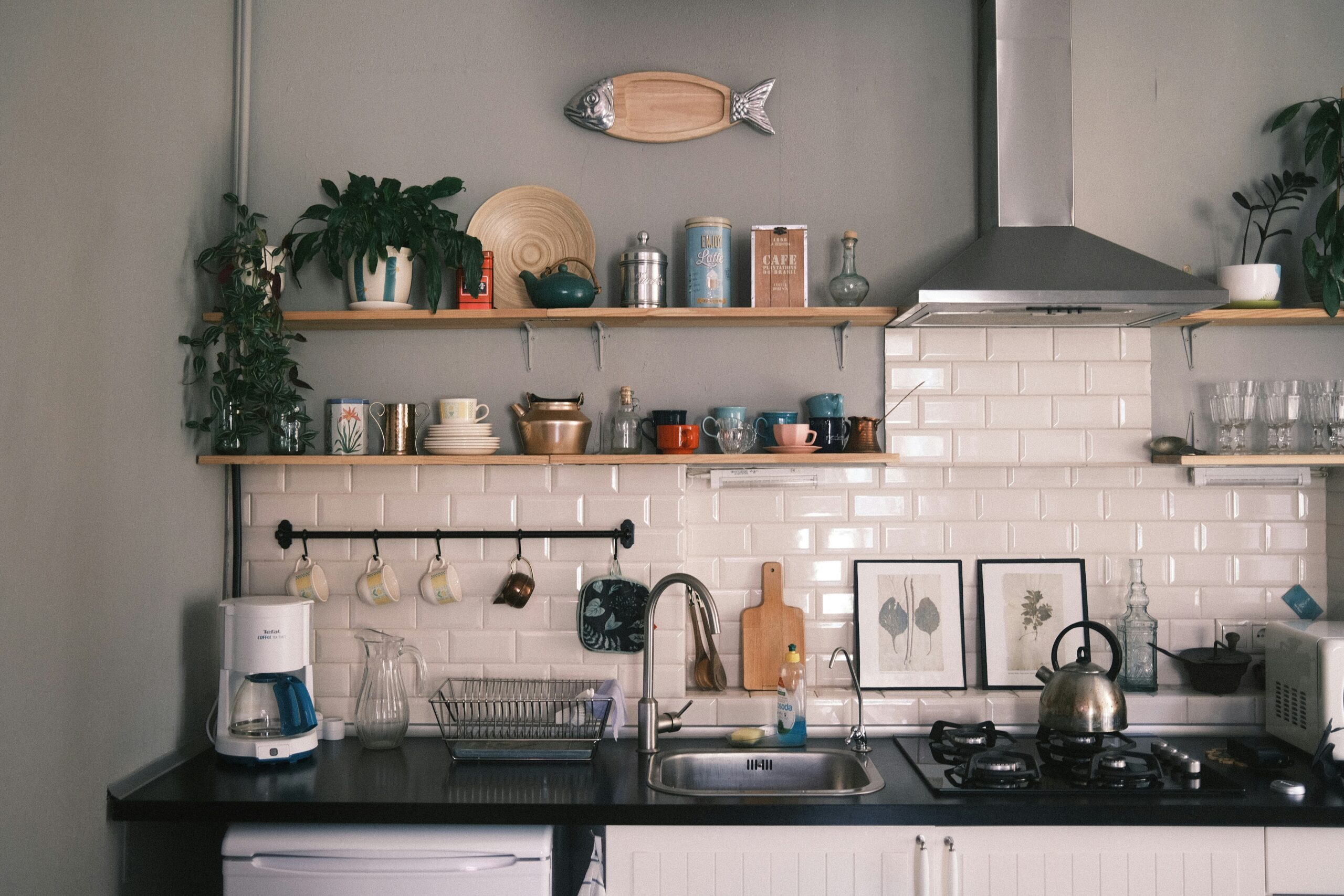 alt="best kitchen essentials for beginners organized kitchen setup with cooking tools and utensils"